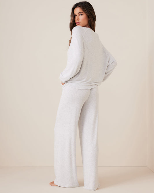 Model is 5'7\ and wears a size S