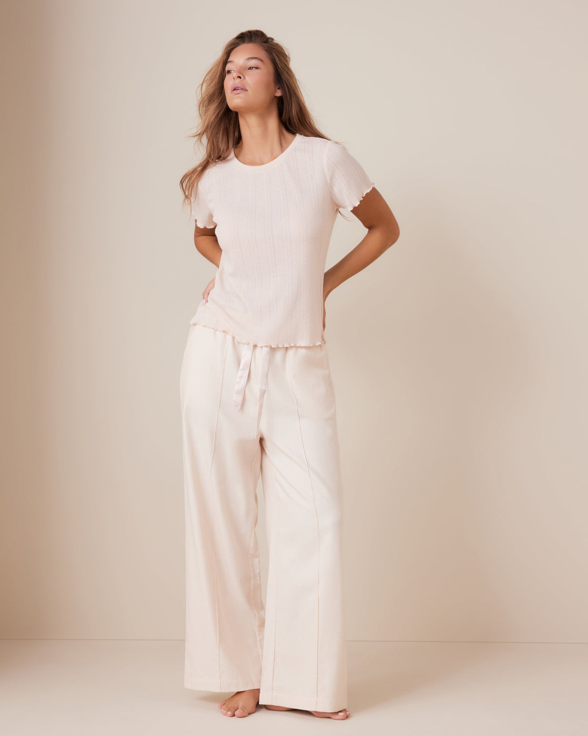 Model is 5'9\ and wears a size S